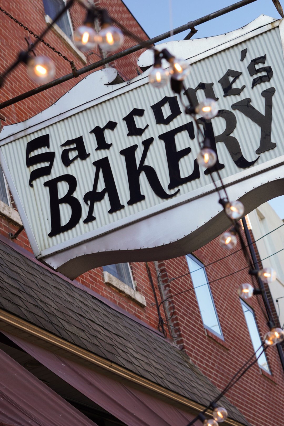 Bakery storefront with warm lighting and inviting atmosphere